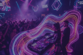 A concert crowd under neon light trails